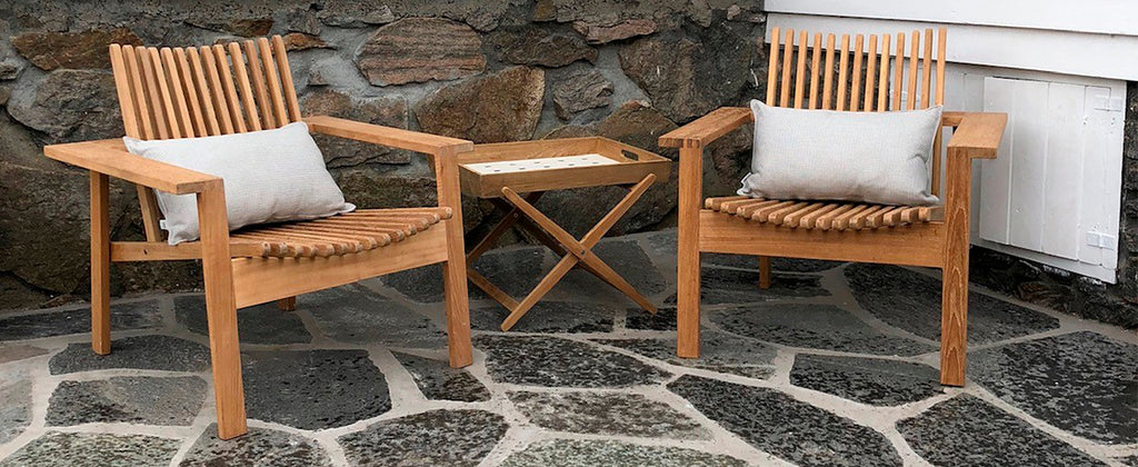 Exclusive outdoor teak lounge chair and folding side table