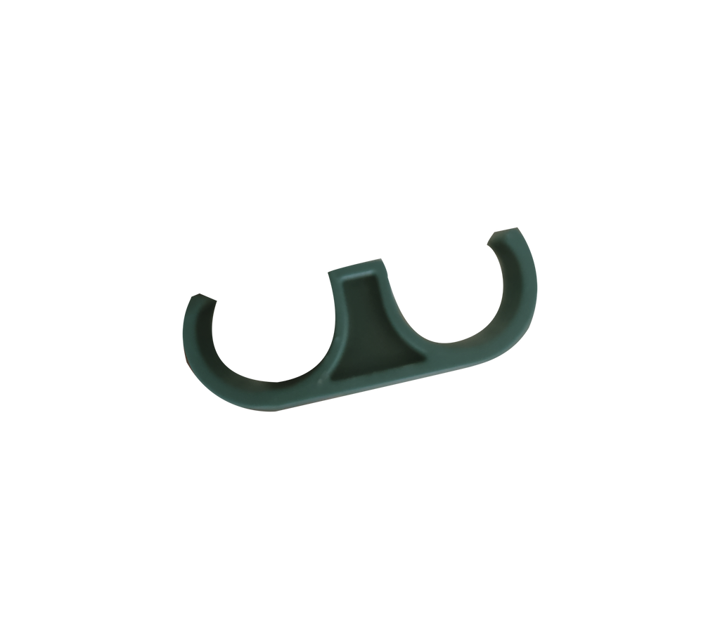 Dark green clip with a uniquely shaped design.