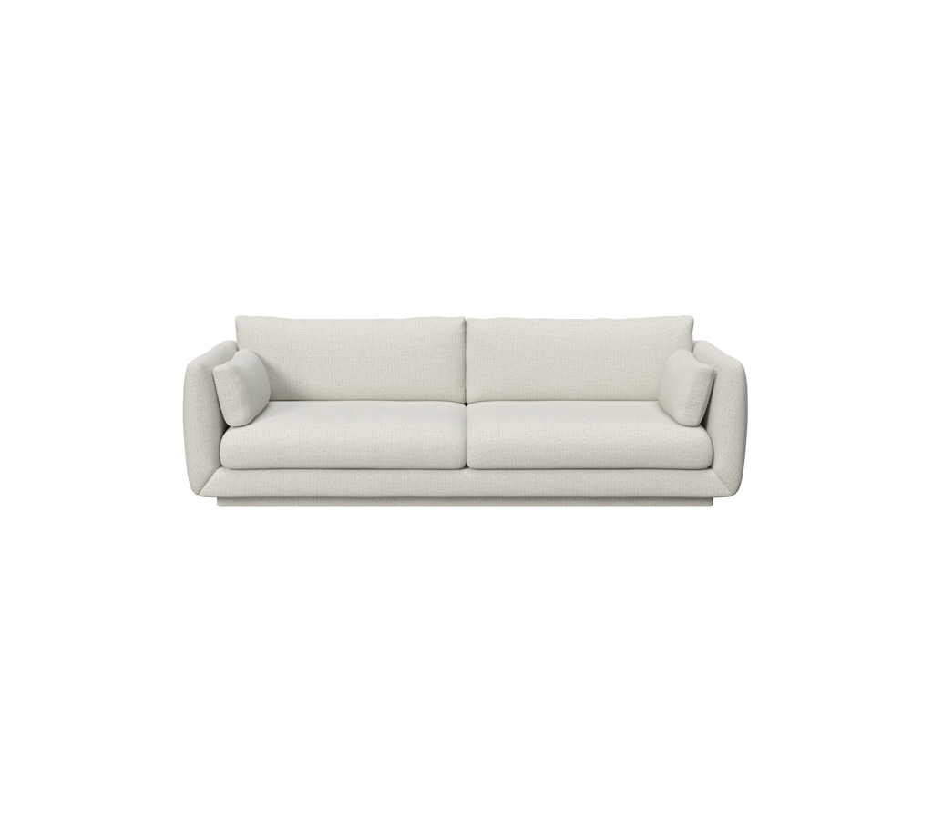 Modern sand-colored sofa with soft cushions and a minimalist design.