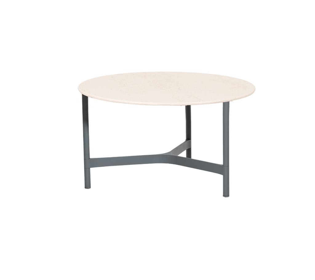 Round table with a light-colored top and a gray metal base featuring a unique support design, suitable for various settings.