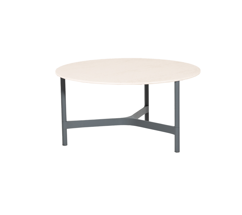 Round table with a smooth light-colored top and a sturdy gray metal base, ideal for dining or casual settings.