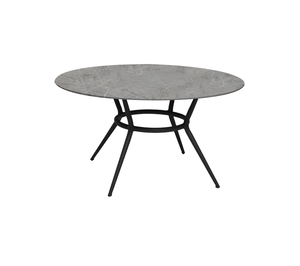Modern round grey table with a sleek design and black legs.