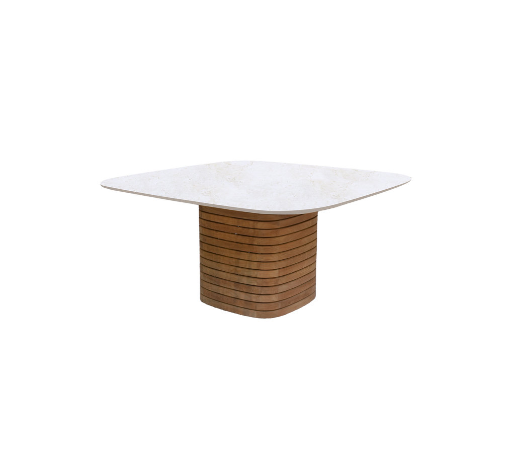 Modern square table with a travertine top and teak base.