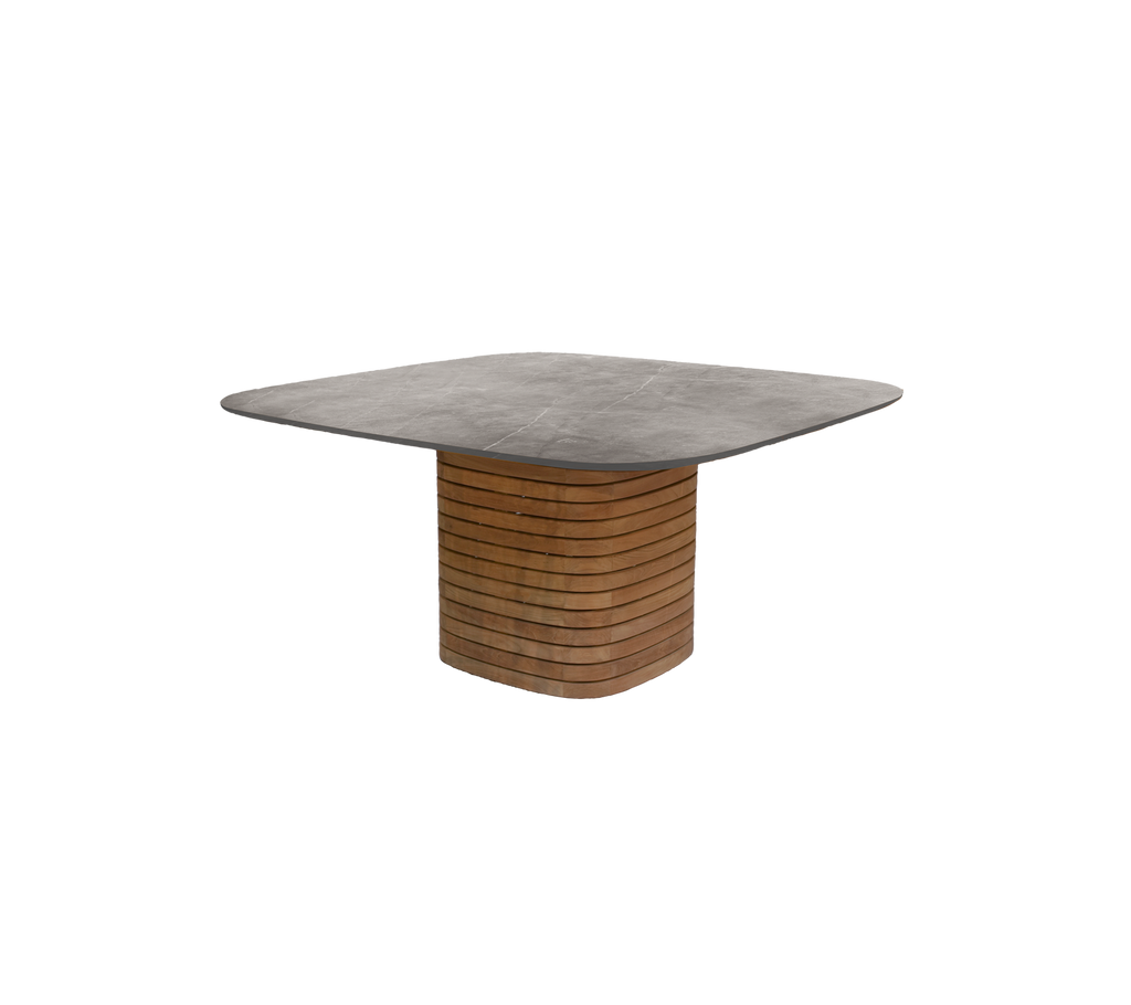 Modern teak dining table with a grey top.