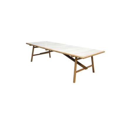 A long, elegant table with a light-colored top and wooden legs, designed for versatility and style in various settings.