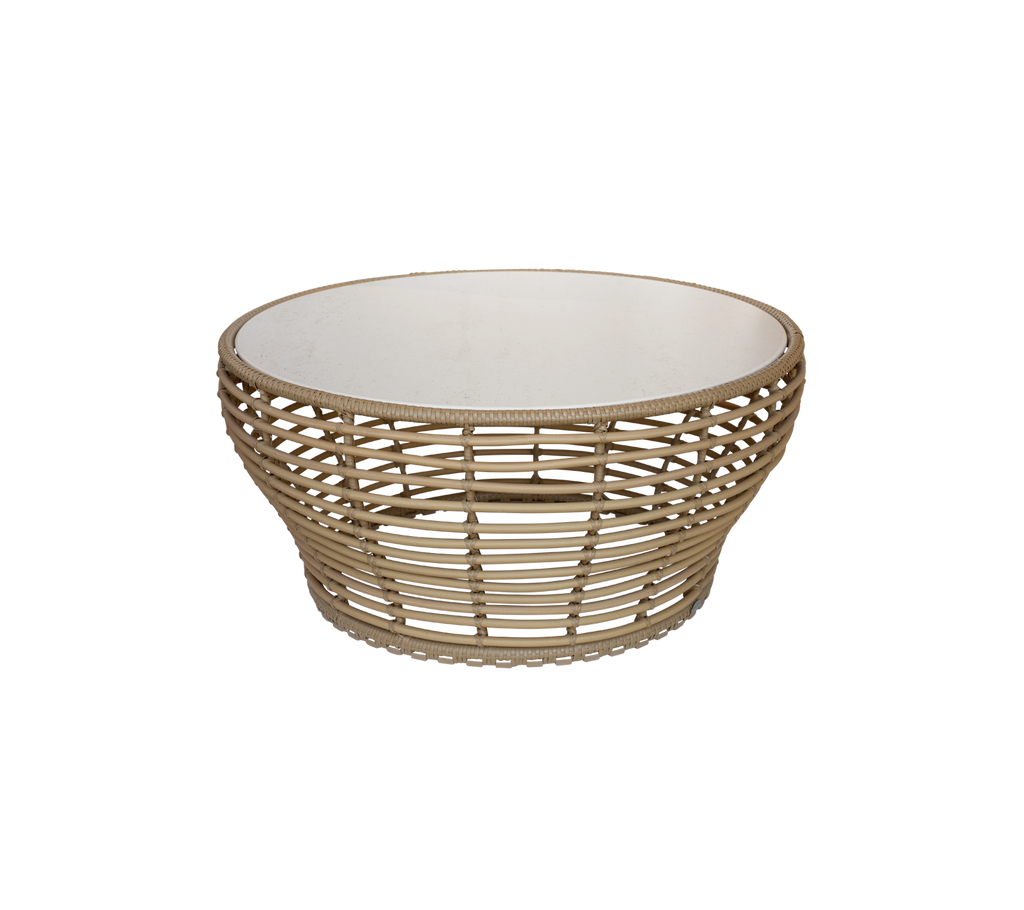 Stylish round basket with a natural woven design and a white interior, perfect for storing items or as a decorative piece.