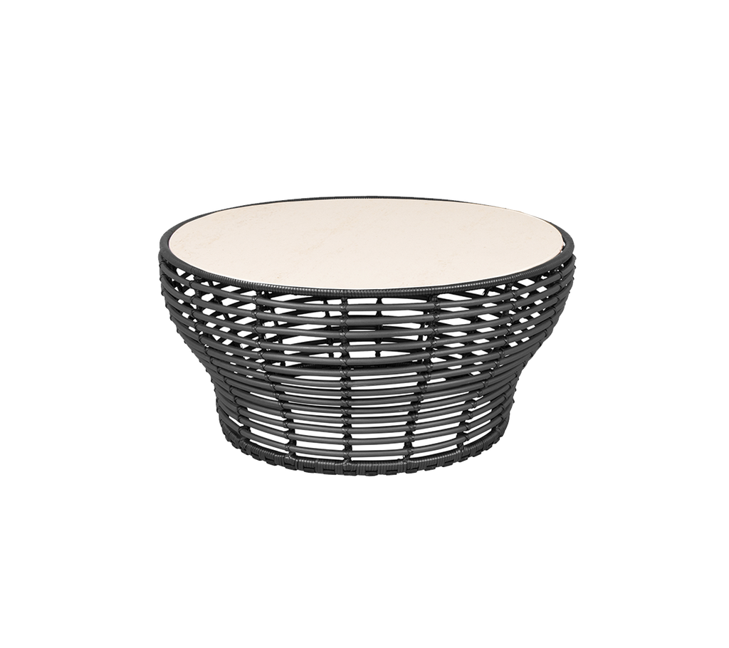 Round coffee table with a woven black base and light-colored top, showcasing a modern and stylish design.
