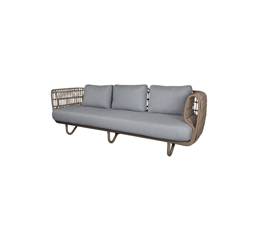 Modern sofa with grey cushions in a stylish design.