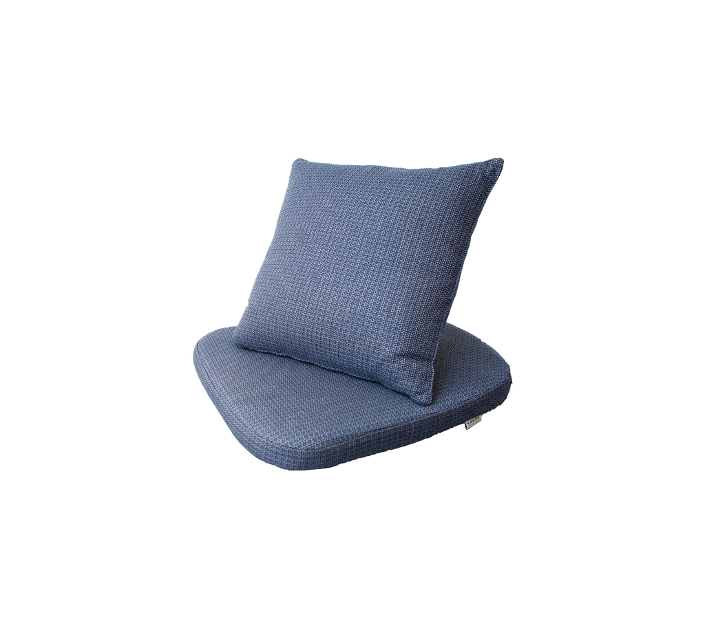 Blue cushion set featuring a flat base and a plump, square pillow for added comfort and style.