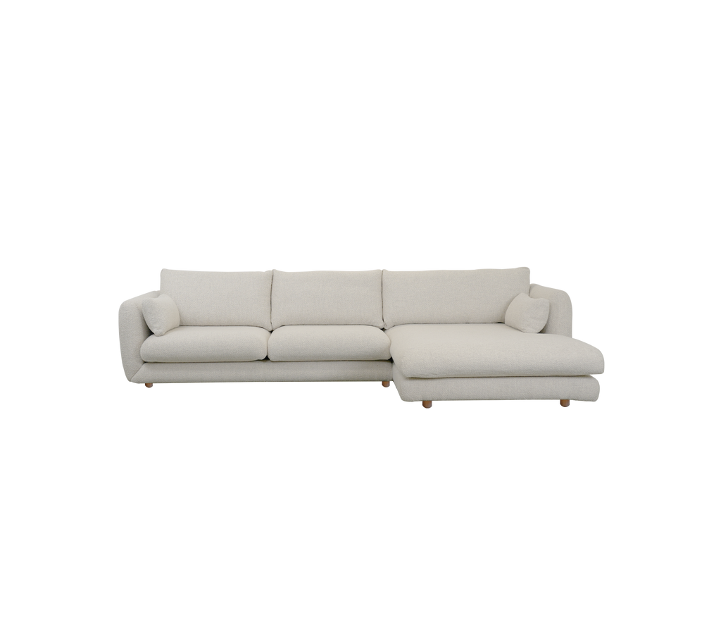 Modern sand sofa with clean lines and a minimalist design.