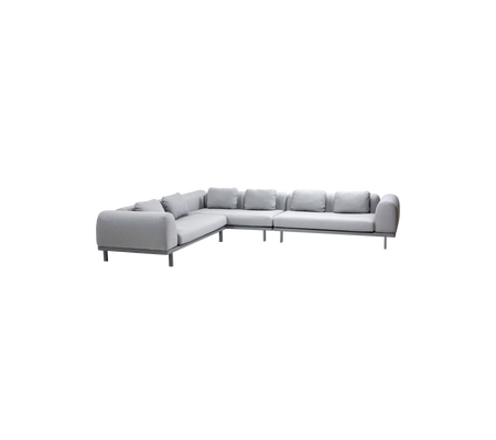 Light grey sectional sofa with plush cushions and modern design, featuring a sleek metal frame for a contemporary look.