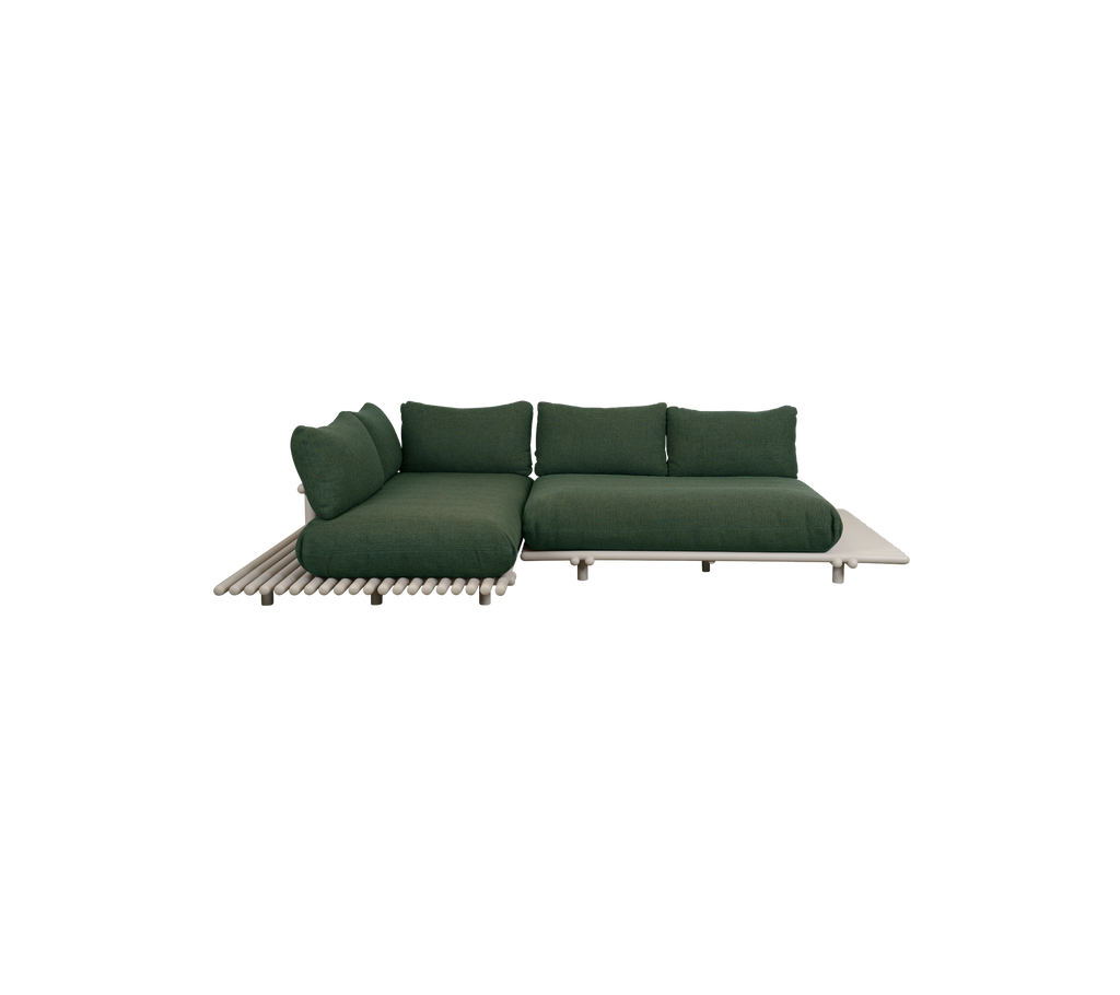 Modern dark green sofa with a minimalist design.